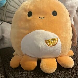 Squishmellow Orange Octopus Plush Toy with a embroidery orange